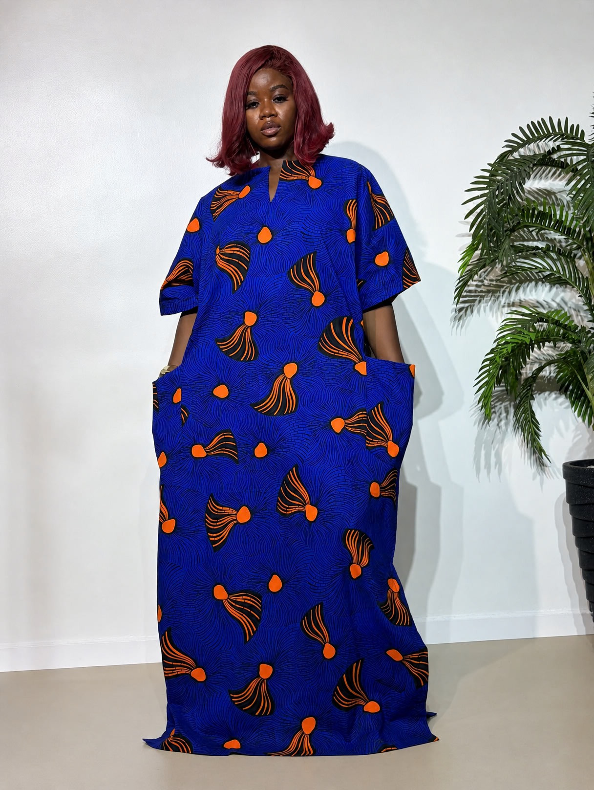 Vintage Boubou featuring vibrant African print fabric in a stylish, free-flowing design for comfortable and elegant everyday wear.